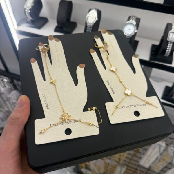 Gold Snowflake Hand Chain Bracelet with Ring - Image 1